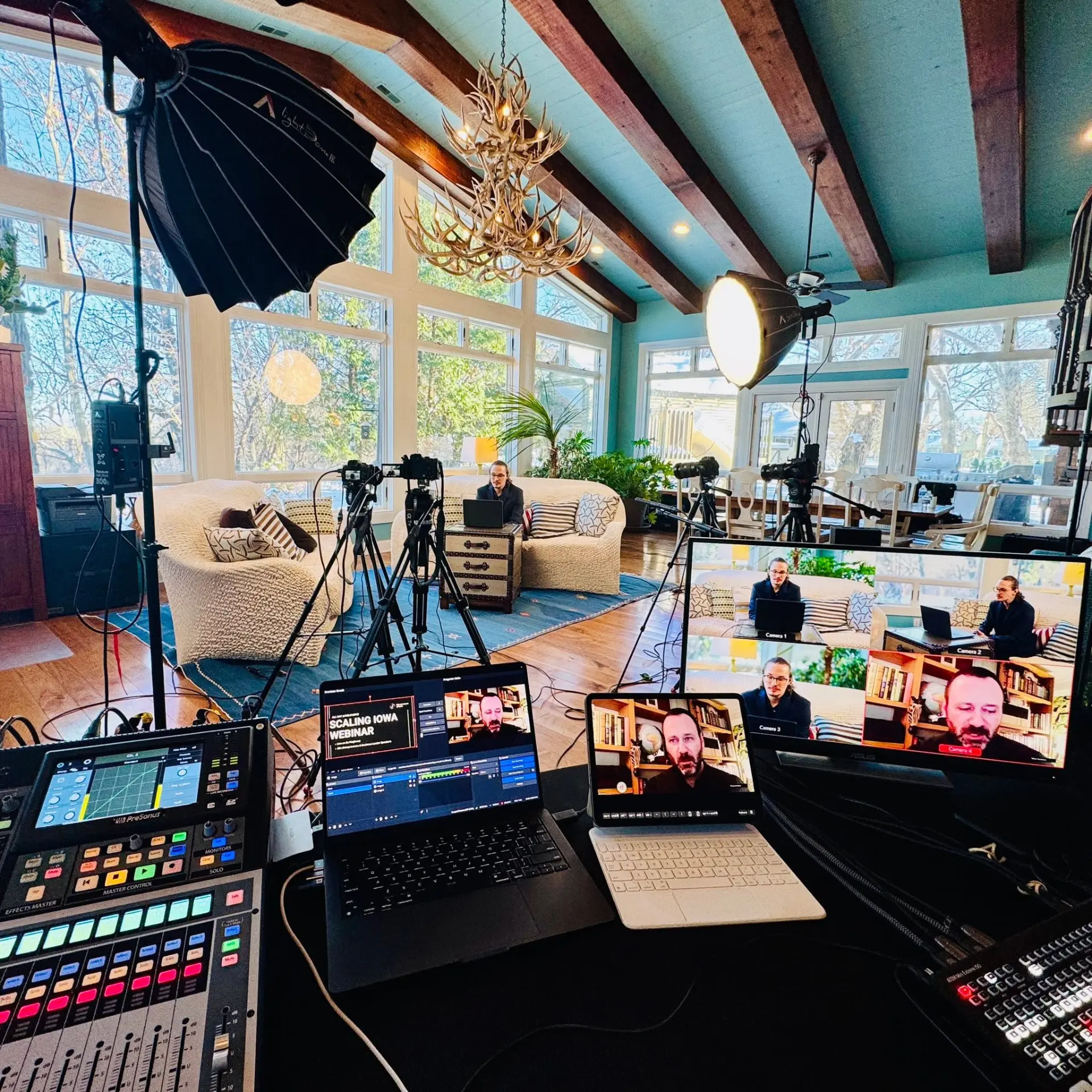 A multi-camera livestream production setup in a light-filled room