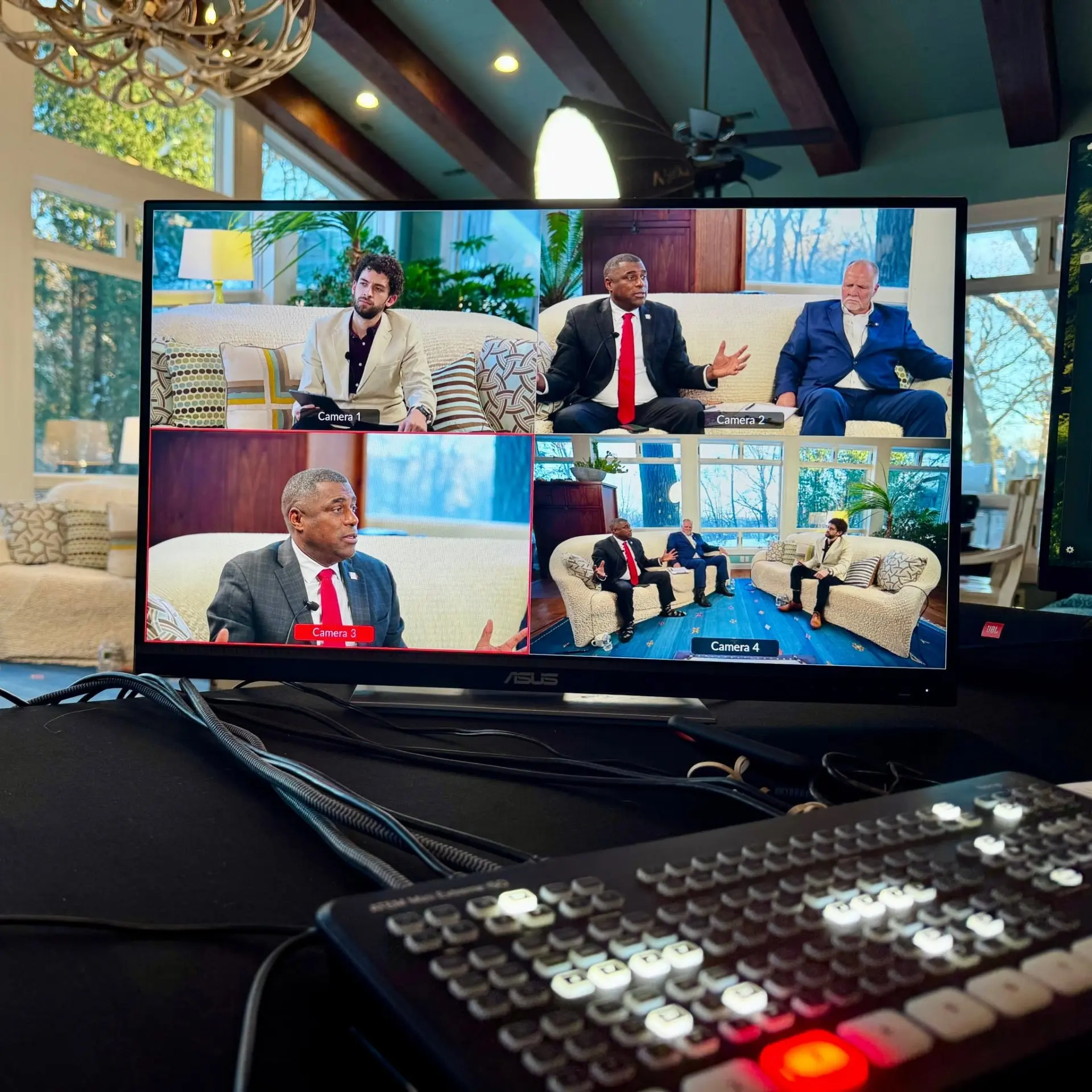 A four-camera livestream production displayed on a control monitor